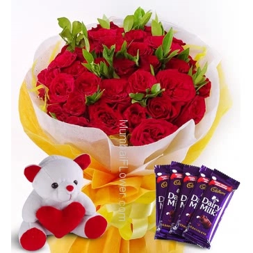 Bunch of 25 Red Roses nicely decorated with fillers ribbons and paper packing, with 6 Inch Teddy Bear and 5pc Cadbury Dairy milk of Rs.25 each